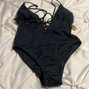 Brand new swimming suit size medium never worn